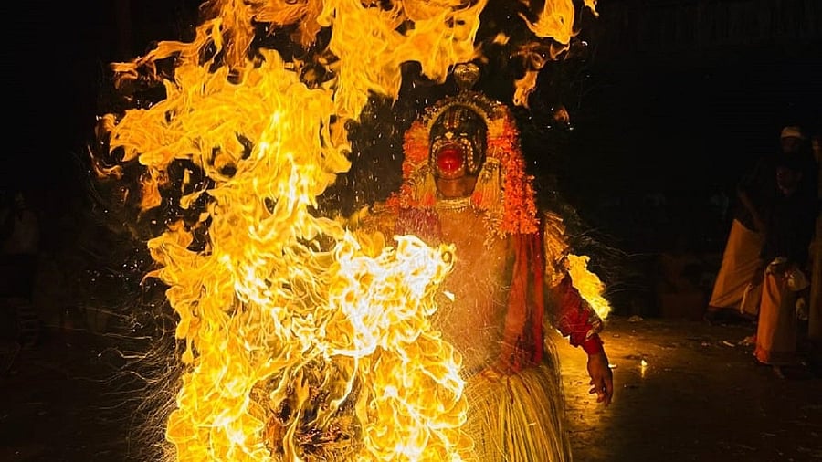 <div class="paragraphs"><p>An artiste performs a ritual involving fire.&nbsp;</p></div>