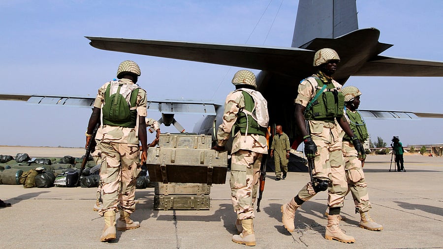 <div class="paragraphs"><p>Nigerian soldiers prepare to load weapons on to a plane. For representational purposes.</p></div>