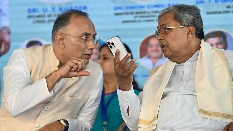 <div class="paragraphs"><p>Chief Minister Siddaramaiah sharing a word with District in charge Minister Dinesh Gundu Rao during foundation-laying ceremony of the regional centre of Rajiv Gandhi University of Health Sciences (RGUHS) at Mary Hill in Mangaluru on Friday . </p></div>