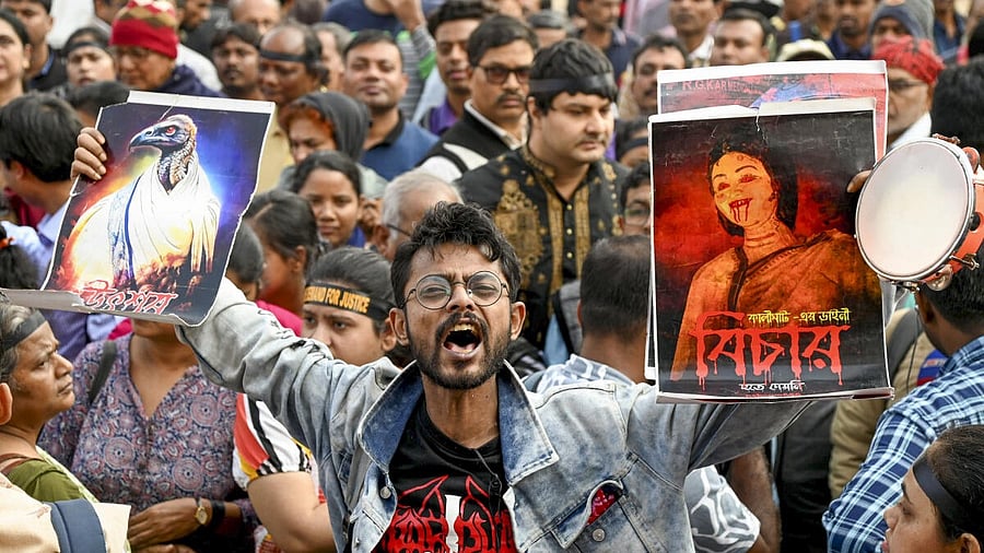 <div class="paragraphs"><p>A member of 'Abhaya Mancha' during a protest as Sanjay Roy, accused in the alleged rape and murder of an on-duty doctor at R G Kar Medical College and Hospital, is produced at a Kolkata court on the day of the verdict, in Kolkata, Saturday, Jan. 18, 2025. The court found Roy guilty in the case.</p></div>