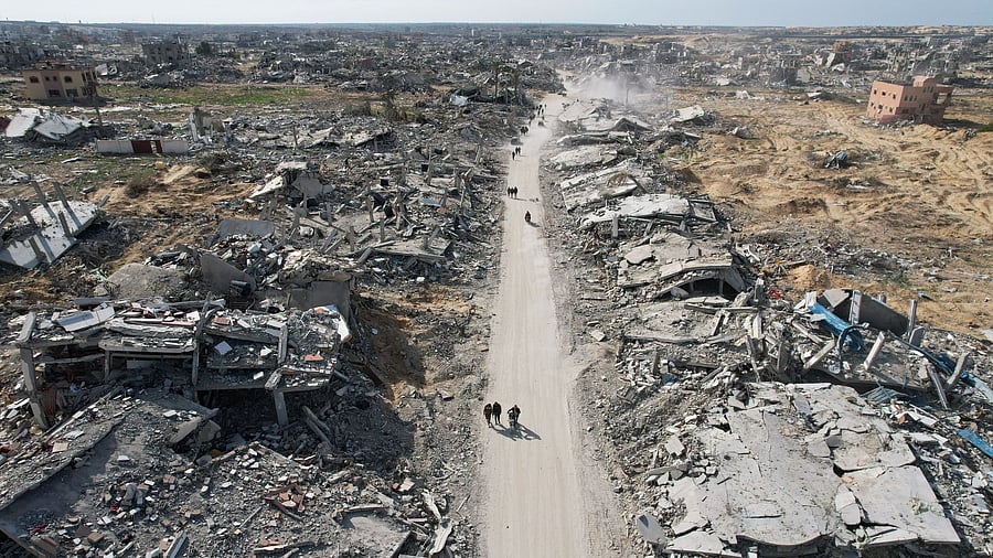 <div class="paragraphs"><p>A drone view shows Palestinians returning to devastated Rafah, amid a ceasefire between Israel and Hamas, in the southern Gaza Strip</p></div>