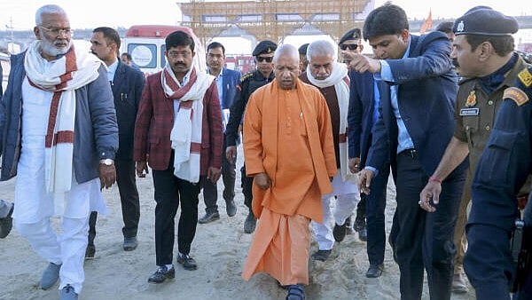 <div class="paragraphs"><p>Uttar Pradesh Chief Minister Yogi Adityanath visits the site after a fire broke out in the Geeta Press camp of the Mahakumbh, in Prayagraj, Sunday.</p></div>