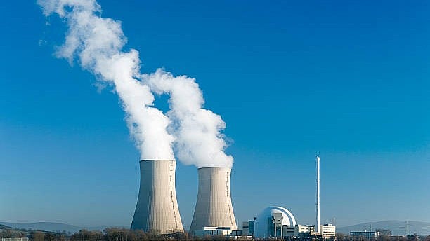 <div class="paragraphs"><p>Representative image showing&nbsp;Nuclear power station with two steaming cooling towers in blue sky.</p></div>