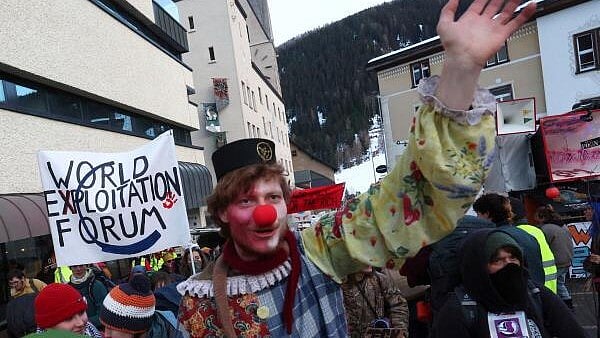<div class="paragraphs"><p>Climate activists and anti-WEF protesters attend a demonstration ahead of the opening of the World Economic Forum, in Davos, Switzerland.</p></div>