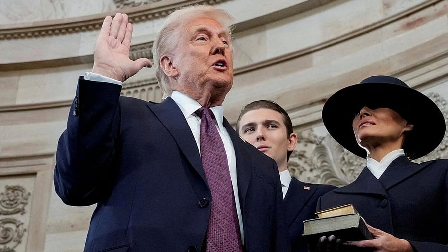 <div class="paragraphs"><p>Donald Trump is sworn in as the 47th President of the United States by Chief Justice John Roberts as Melania Trump holds the Bible during the 60th Presidential Inauguration in the Rotunda of the U.S. Capitol in Washington, U.S., January 20, 2025.</p></div>