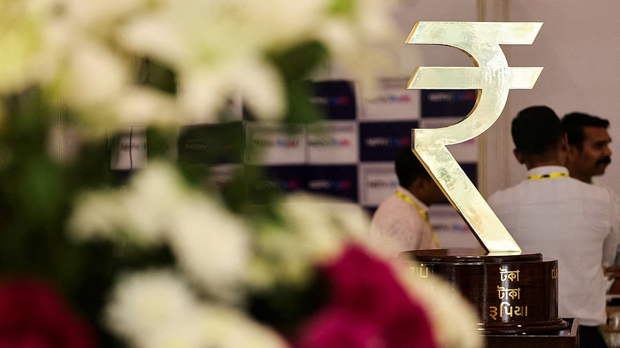 <div class="paragraphs"><p>The Indian Rupee logo is seen inside the Reserve Bank of India (RBI) headquarters in Mumbai, December 6, 2024. </p></div>