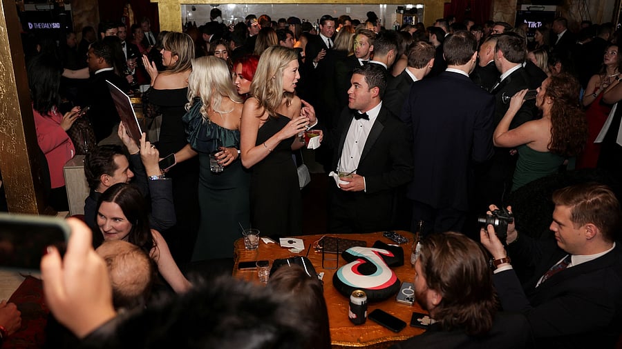 <div class="paragraphs"><p>Guests attend the Power 30 Awards, an inauguration party sponsored by TikTok for influencers who supported US President-elect Donald Trump</p></div>