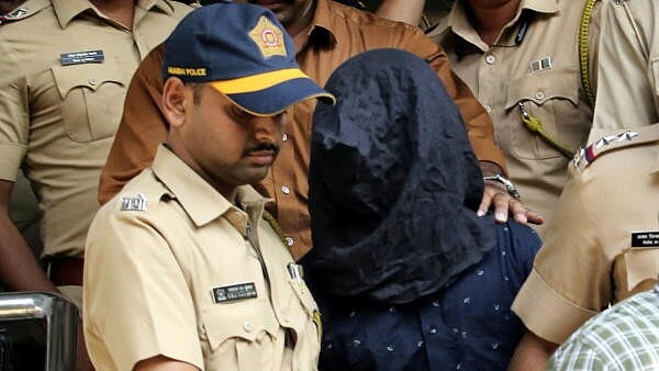 <div class="paragraphs"><p>Police personnel take the accused, arrested in connection with the alleged attack on Bollywood actor Saif Ali Khan, to a hospital for medical examination.</p></div>