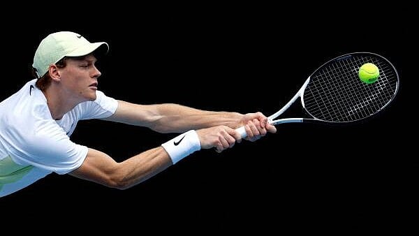 <div class="paragraphs"><p>Jannik Sinner in action</p></div>