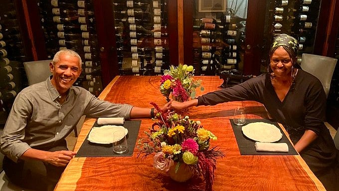 <div class="paragraphs"><p>Former US president Barack Obama shared of a picture of himself and Michelle Obama sitting across each other reaching out to hold hands.</p></div>