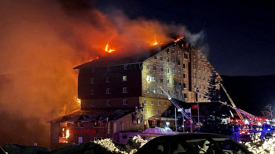 <div class="paragraphs"><p>Firefighters work to extinguish a fire at a hotel in the ski resort of Kartalkaya in Bolu province, Turkey, January 21, 2025</p></div>