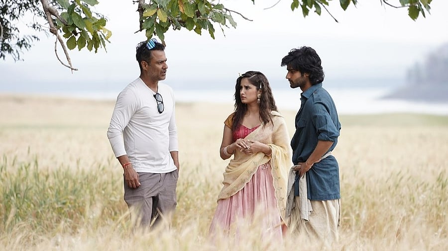 <div class="paragraphs"><p>Abhishek Kapoor with Rasha Thadani and Aaman Devgan on the sets of <em>Azaad</em>.</p></div>