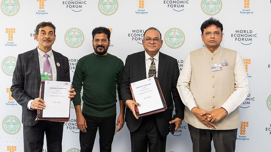 <div class="paragraphs"><p>Telangana Chief Minister A Revanth Reddy (second from left) after signing the MoU with Sun Petrochemicals officials at Davos.</p></div>
