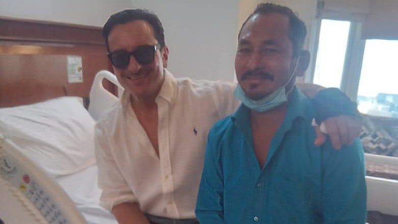 <div class="paragraphs"><p>Saif Ali Khan with rickshaw driver Bhajan Singh Rana.</p></div>