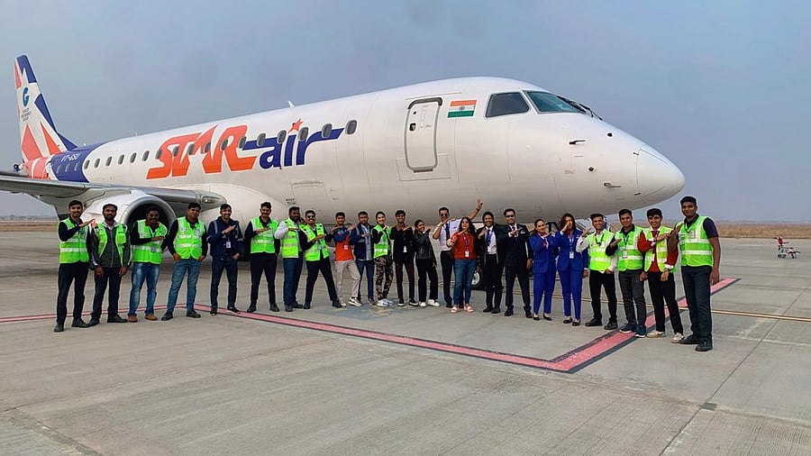 <div class="paragraphs"><p>A Star Air aircraft along with its crew members.&nbsp;</p></div>