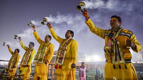 <div class="paragraphs"><p>Priests perform 'Ganga Arti' during the Maha Kumbh Mela 2025, in Prayagraj, Uttar Pradesh.&nbsp;</p></div>