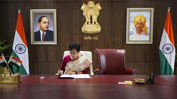 <div class="paragraphs"><p>Delhi CM Atishi seen in the CM's office</p></div>