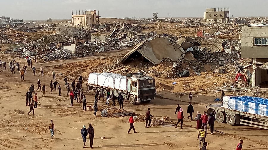 <div class="paragraphs"><p>Aid trucks cross into the Gaza Strip.</p></div>