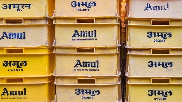 <div class="paragraphs"><p>Crates of Amul milk. </p></div>