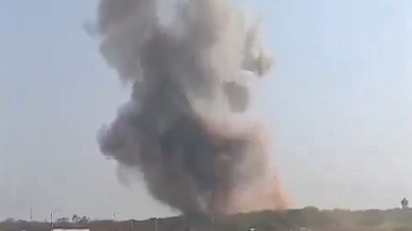 <div class="paragraphs"><p>Smoke rising from the ordnance factory where the blast took place</p></div>