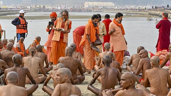 <div class="paragraphs"><p>Newly-initiated 'Naga Sadhus' of 'Shri Panchayati Akhara Mahanirvani' perform rituals during the ongoing Maha Kumbh Mela 2025, at Sangam, in Prayagraj. (Image for representation)&nbsp;</p></div>