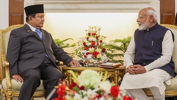 <div class="paragraphs"><p>In this image provided by PMO, Prime Minister Narendra Modi with Indonesian President Prabowo Subianto during a meeting, at the Hyderabad House in New Delhi.</p></div>
