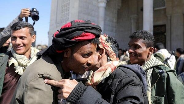 <div class="paragraphs"><p>A person detained by the Houthis meets their family member after their release, in Sanaa, Yemen January 25, 2025.</p></div>