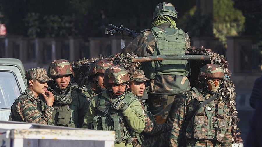 <div class="paragraphs"><p>Security personnel stand guard  ahead of  Republic Day.</p></div>