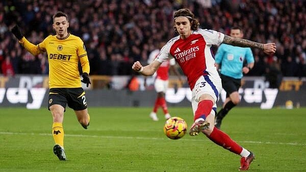 <div class="paragraphs"><p>Premier League - Wolverhampton Wanderers v Arsenal - Molineux Stadium, Wolverhampton, Britain - January 25, 2025 Arsenal's Riccardo Calafiori scores their first goal.</p></div>