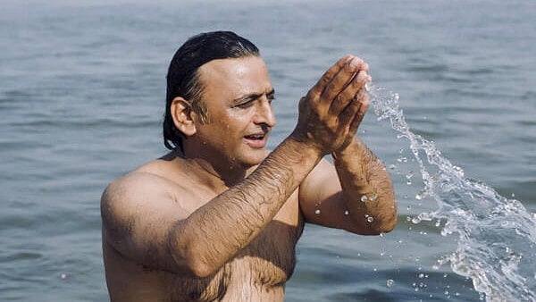 <div class="paragraphs"><p>Samajwadi Party chief Akhilesh Yadav takes a holy dip at Sangam during the ongoing Maha Kumbh Mela 2025, in Prayagraj on Sunday.</p></div>