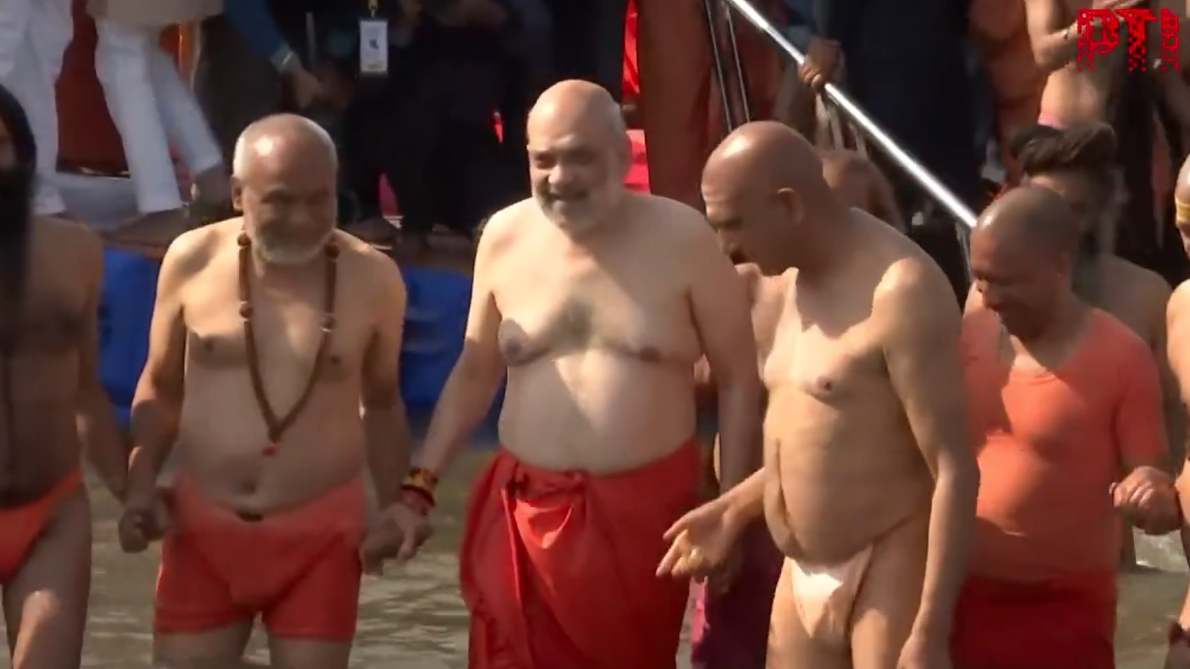 <div class="paragraphs"><p>Amit Shah takes a dip at Triveni Sangam.</p></div>