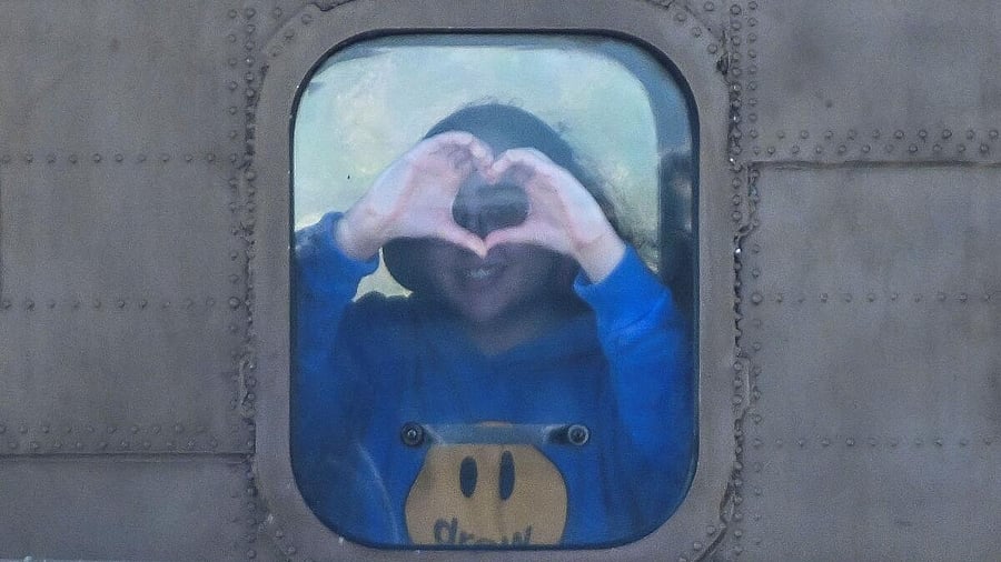 <div class="paragraphs"><p>Released Israeli hostage Liri Albag, a soldier who was seized from her army base in southern Israel during the October 7, 2023, attack on Israel by Hamas, gestures to make a heart shape in an Israeli military helicopter transporting her and other hostages, released as part of a ceasefire and a hostages-prisoners swap deal between Hamas and Israel, to the Beilinson Schneider medical complex in Petah Tikva, Israel, January 25, 2025.</p></div>