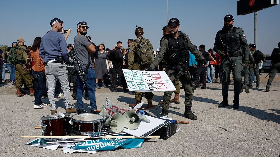 <div class="paragraphs"><p>A member of Israeli security forces throws a protester's placard on a pile of objects while Israeli and Palestinian peace activists demonstrate to demand the end of the war in Gaza. Representational purpose.</p></div>