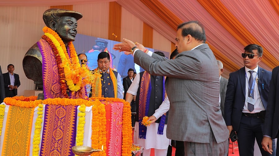<div class="paragraphs"><p>Assam CM Himanta Biswa Sarma offering garlands at the statue of Upendra Nath Brahma, the father of the Bodo community, in Kokrajhar on Tuesday. </p></div>