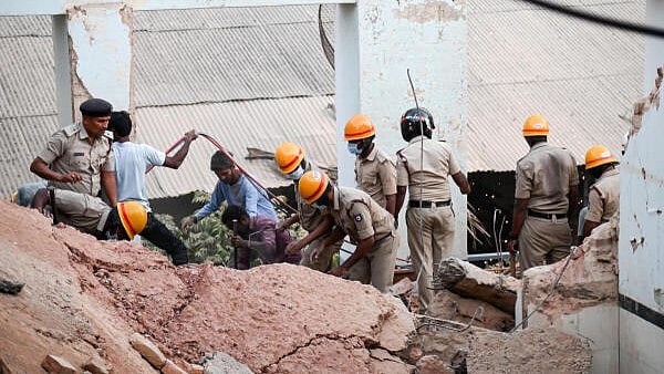 <div class="paragraphs"><p>Personnel of the Fire and Emergency Services department during the rescue operation at Maharani's Women's Science College, on Jhansi Lakshmi Bai Road, in Mysuru.&nbsp;</p></div>