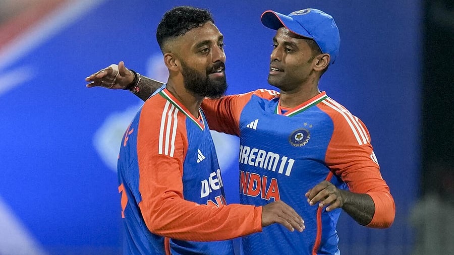 <div class="paragraphs"><p>Varun Chakravarthy (left) with Indian skipper Suryakumar Yadav.</p><p></p></div>