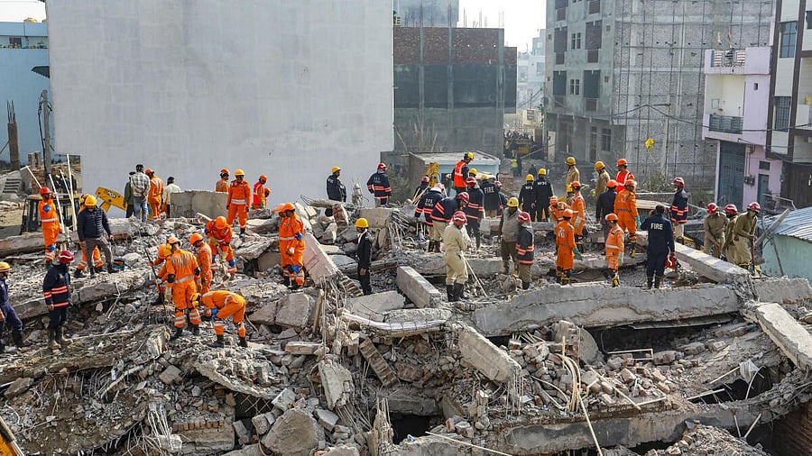 <div class="paragraphs"><p>Rescue work underway after a four-storey building collapsed, at Burari area, in New Delhi</p></div>
