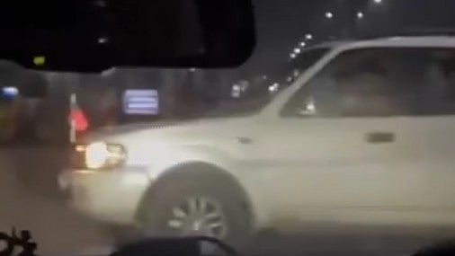 <div class="paragraphs"><p>The car with the DMK flag blocking the women's car, as seen in the video.</p></div>
