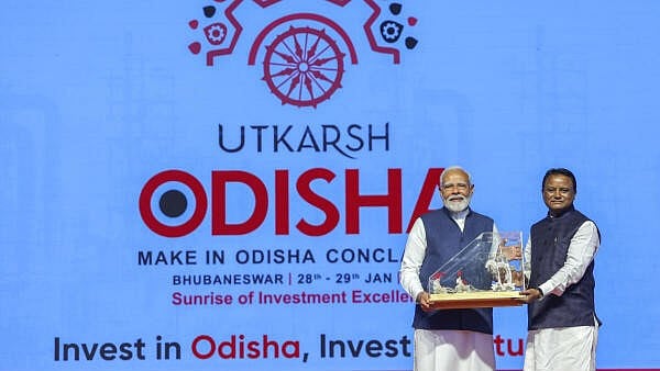 <div class="paragraphs"><p>Prime Minister Narendra Modi with Odisha Chief Minister Mohan Charan Majhi during the 'Utkarsh Odisha' - Make in Odisha Conclave, in Bhubaneswar.</p></div>
