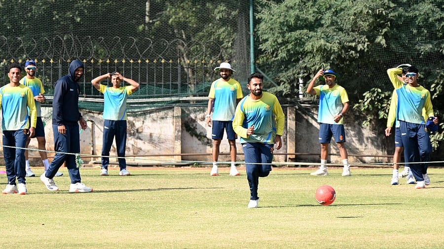 <div class="paragraphs"><p>Karnataka players go though their paces during a practice session at the M Chinnaswamy Stadium in Bengaluru.</p></div>