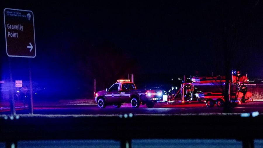 <div class="paragraphs"><p>Emergency vehicles leave Gravelly Point, after American Eagle flight 5342 collided with a helicopter while approaching Reagan Washington National Airport and crashed in the Potomac River, in Arlington, Virginia</p></div>