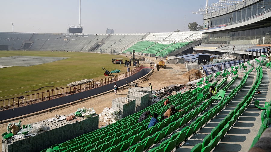 <div class="paragraphs"><p>Labourers work during a media tour, organized by the Pakistan Cricket Board, to showcase the progress of the renovation work ahead of the ICC Champions Trophy 2025 tournament at the Gaddafi Stadium in Lahore, Pakistan January 20, 2025. </p></div>
