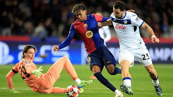<div class="paragraphs"><p>Football - Champions League - FC Barcelona v Atalanta - Estadi Olimpic Lluis Companys, Barcelona, Spain - January 29, 2025 FC Barcelona's Lamine Yamal in action with Atalanta's Sead Kolasinac and Atalanta's Marco Carnesecchi before scoring their first goal.</p></div>