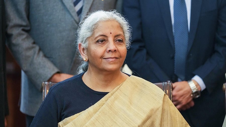<div class="paragraphs"><p>Union Finance Minister Nirmala Sitharaman poses for photohraph after giving final touches to the Union Budget 2025, in New Delhi. </p></div>