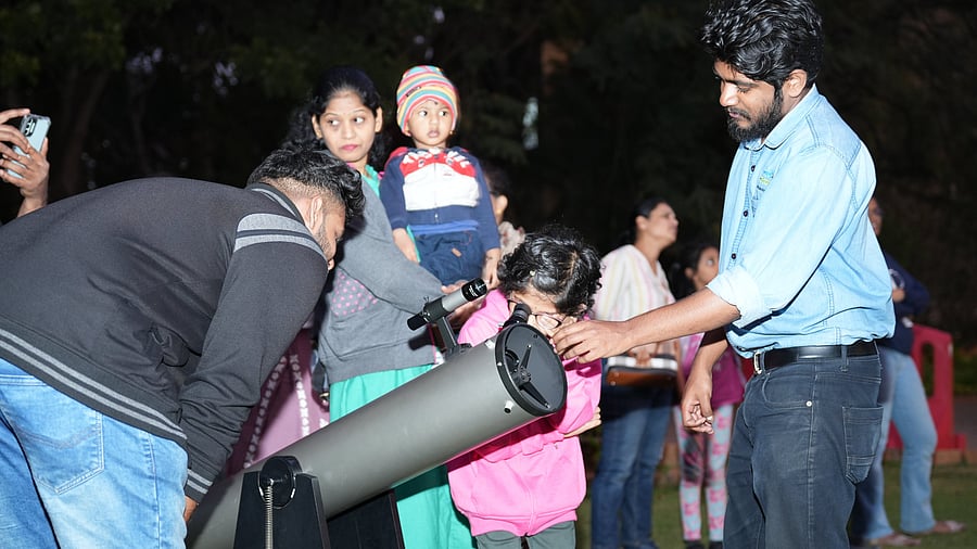<div class="paragraphs"><p>Participants at the sky watch at the Raman Research Institute (RRI) on Friday. </p></div>