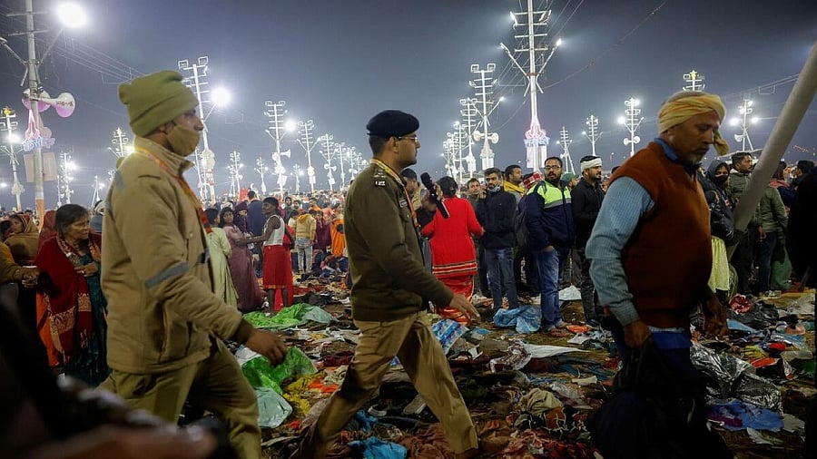 <div class="paragraphs"><p>Policemen walk as they leave after a deadly stampede at the 'Maha Kumbh Mela', in Prayagraj.</p></div>