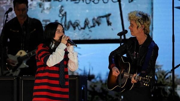 <div class="paragraphs"><p>Billie Joe Armstrong of Green Day and Billie Eilish perform during the FireAid benefit concert for Los Angeles wildfire relief efforts,</p></div>