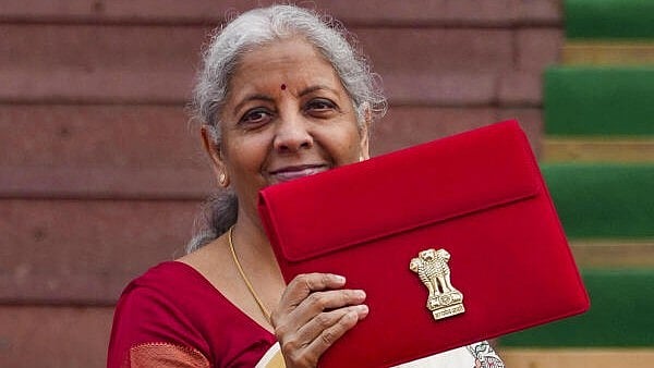 <div class="paragraphs"><p>Union Finance Minister Nirmala Sitharaman upon her arrival at the Parliament House complex to present the ‘Union Budget 2025-26’, in New Delhi</p></div>