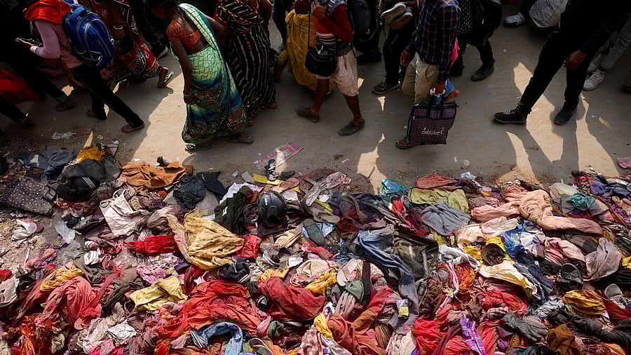 <div class="paragraphs"><p>Devotees leave after attending the Maha Kumbh Mela, as belongings of stampede victims lie on the ground, a day after a deadly stampede, in Prayagraj, Uttar Pradesh, January 30, 2025.</p></div>