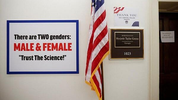 <div class="paragraphs"><p>A sign hangs on the wall outside U.S. Rep. Marjorie Taylor Greene's office after the congresswoman placed it there in the midst of debate over The Equality Act on Capitol Hill in Washington</p></div>